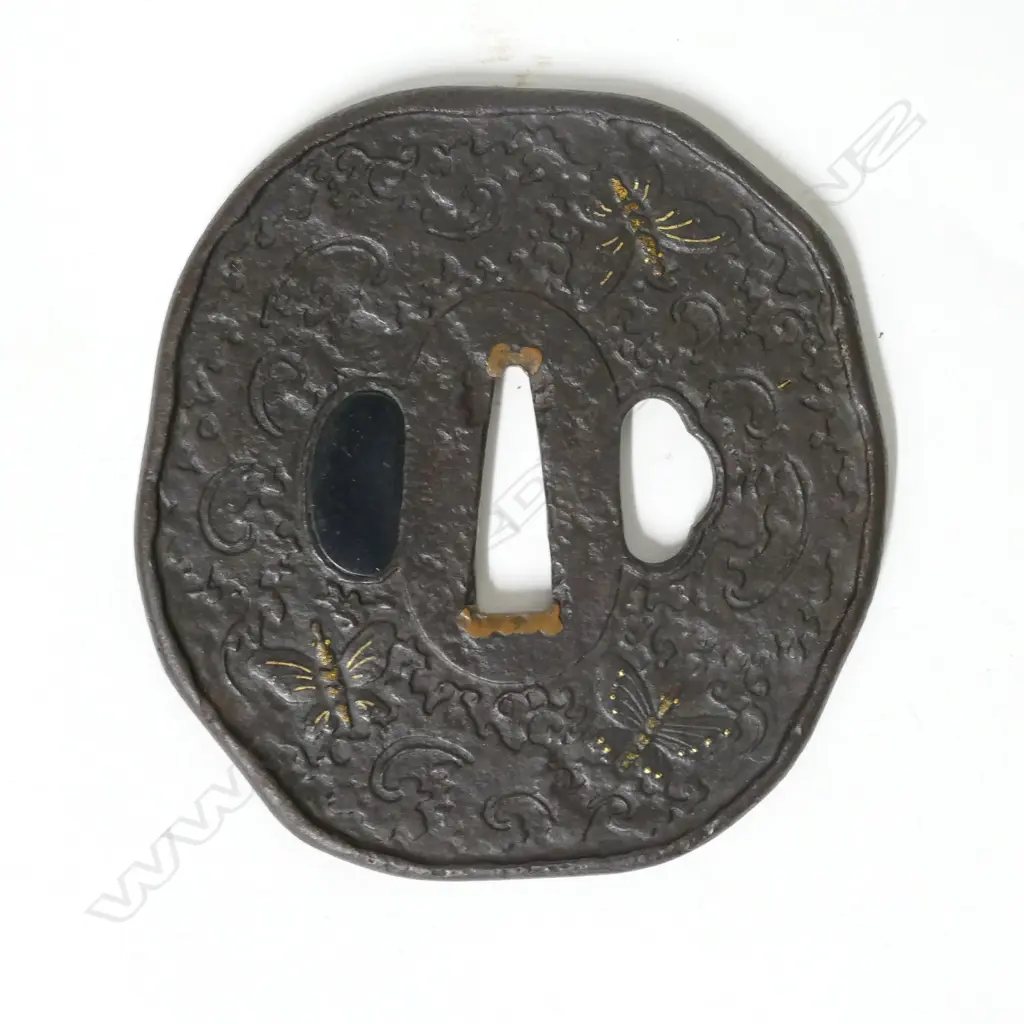 A late Edo tsuba Image 1++