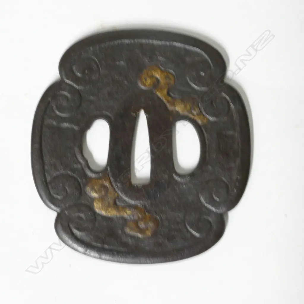 A late Edo period tsuba Image 1++