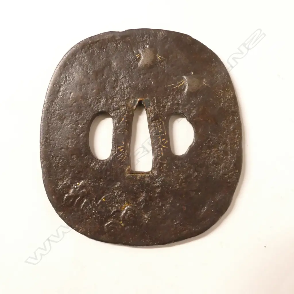A late Edo period tsuba Image 1++