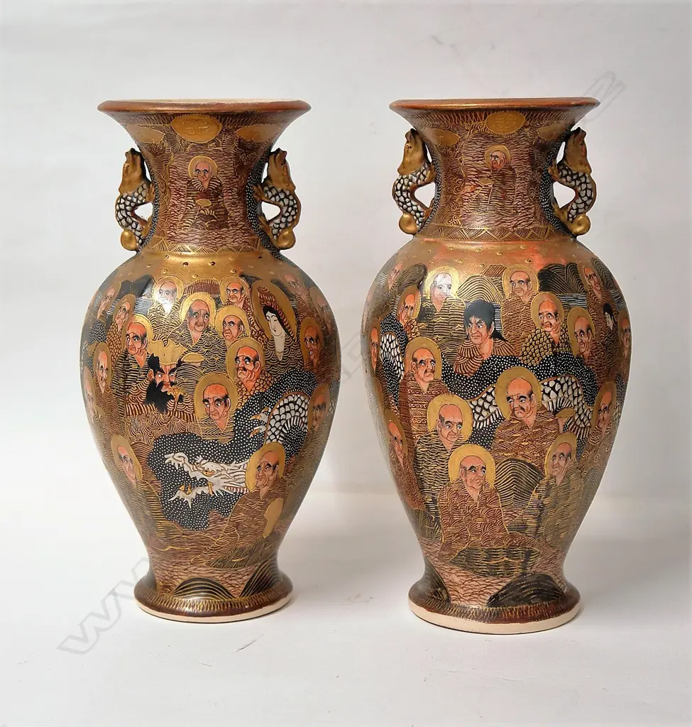 A pair of Japanese Meiji period vases in the 'Thousand Faces' pattern Image 1++