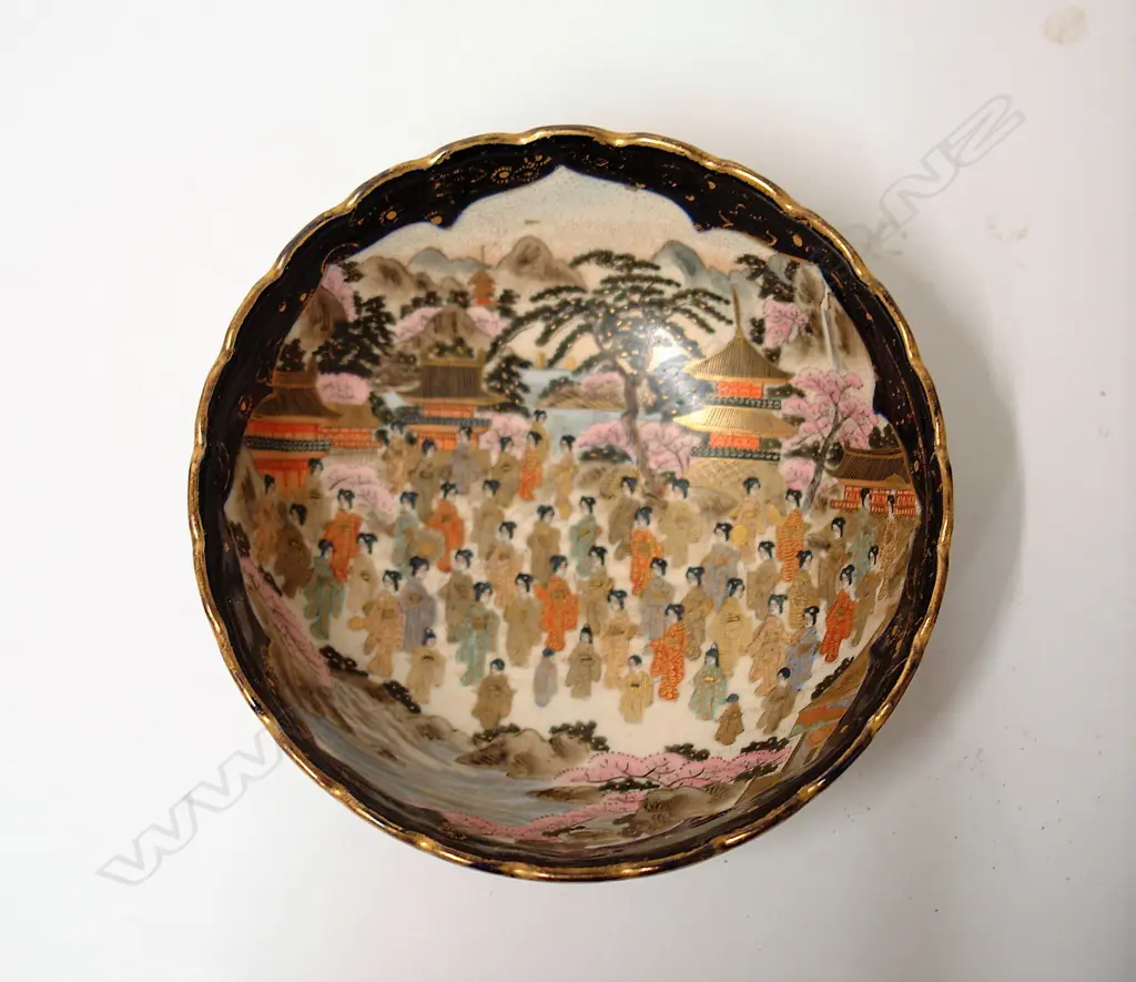 A Japanese Meiji period 'Thousand Faces' decorated bowl Image 1++