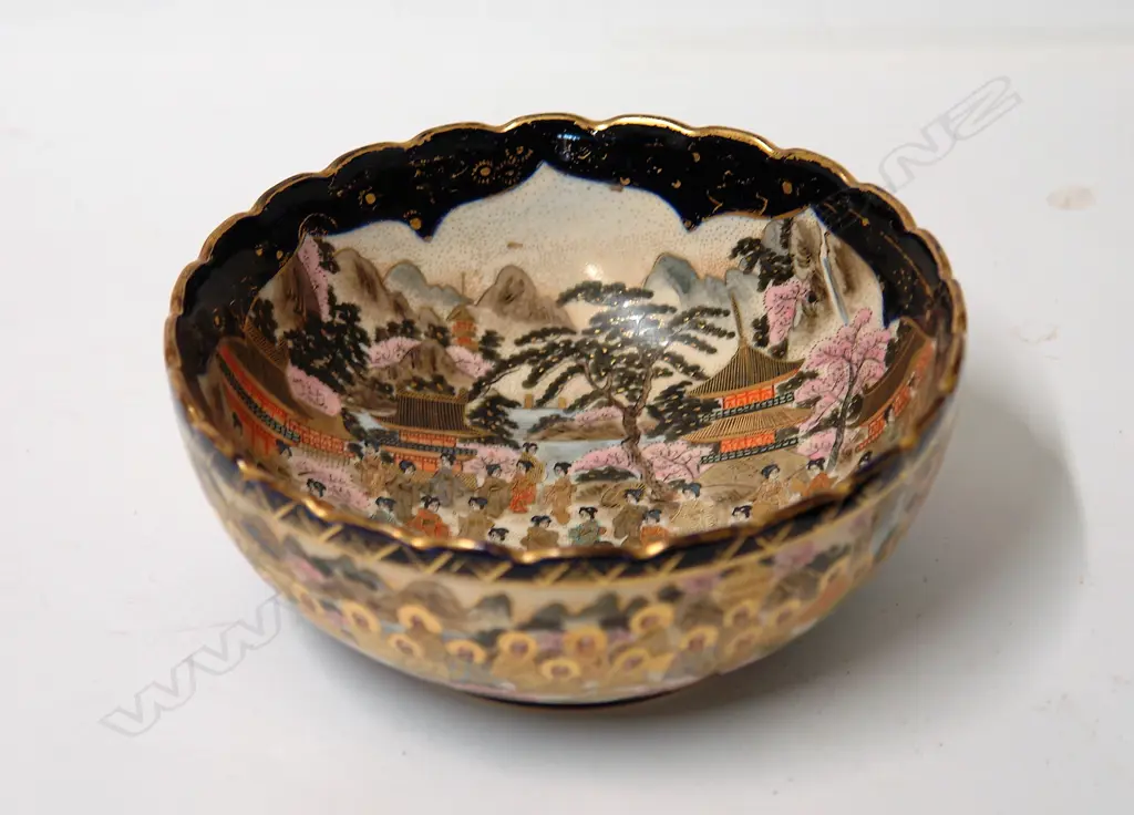 A Japanese Meiji period 'Thousand Faces' decorated bowl Image 1++