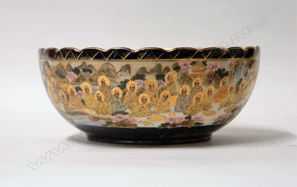 A Japanese Meiji period 'Thousand Faces' decorated bowl Image 1++