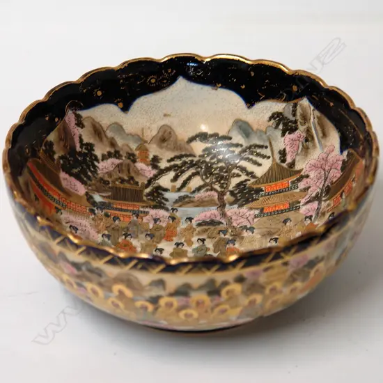 A Japanese Meiji period 'Thousand Faces' decorated bowl