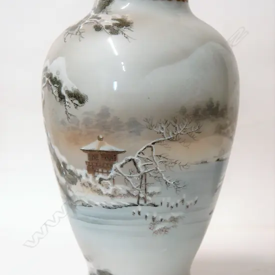 An early 20thC Japanese porcelain winter scene painted and enamel vase