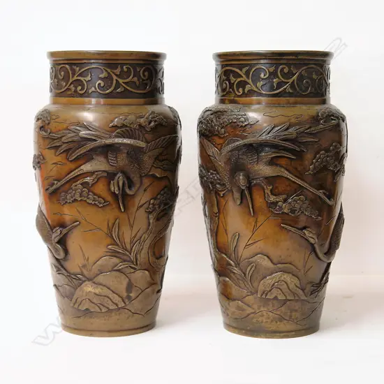 A pair of good quality Japanese Meiji period decorative bronze vases