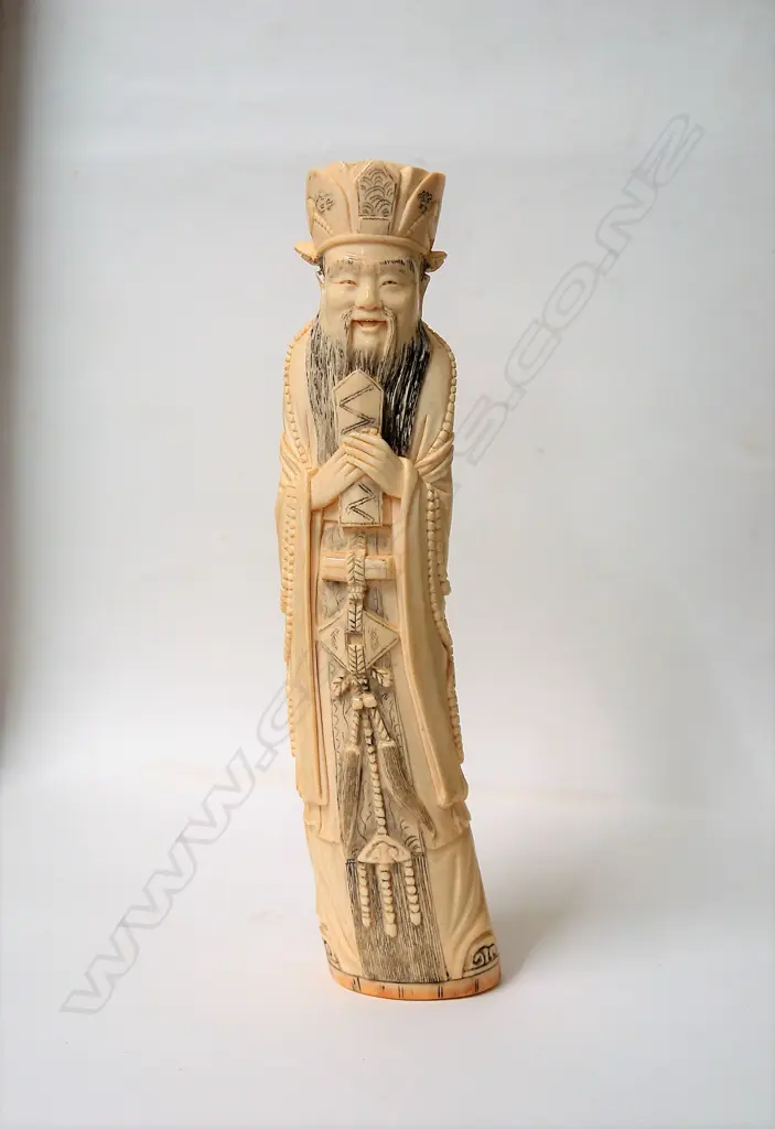 A Chinese large old carved ivory figure of an emperor Image 1++