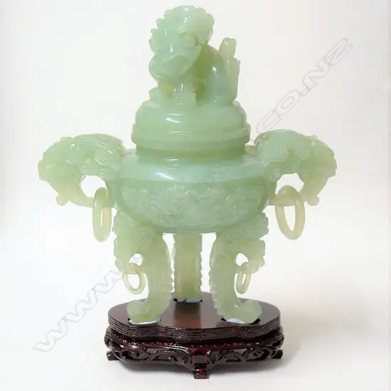 A Chinese pale green jade lidded censor