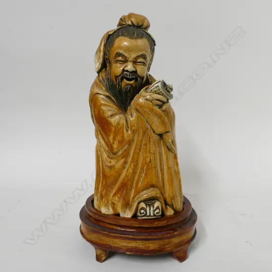 A massive mammoth ivory tusk carving