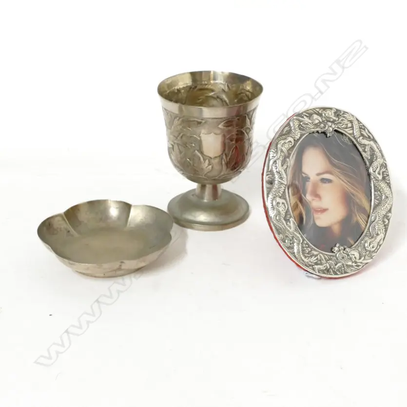 A small Chinese silver cup and dish together with a small photo frame Image 1++