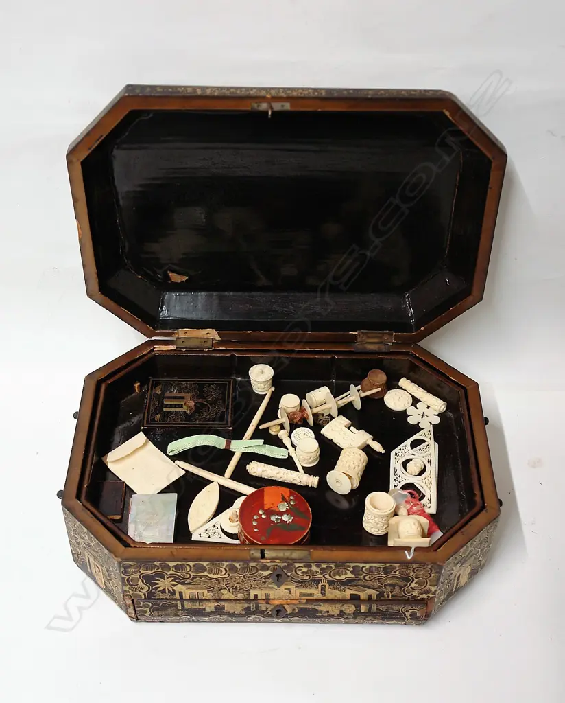 A 19thC Chinese black lacquer and gilt sewing box with carved bone fittings Image 1++