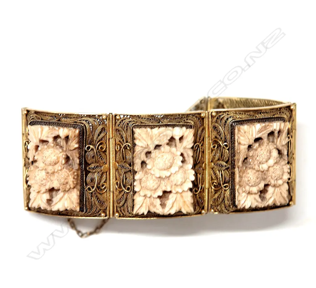 A vintage Eastern silver gilt and carved ivory panelled wide bracelet Image 1++