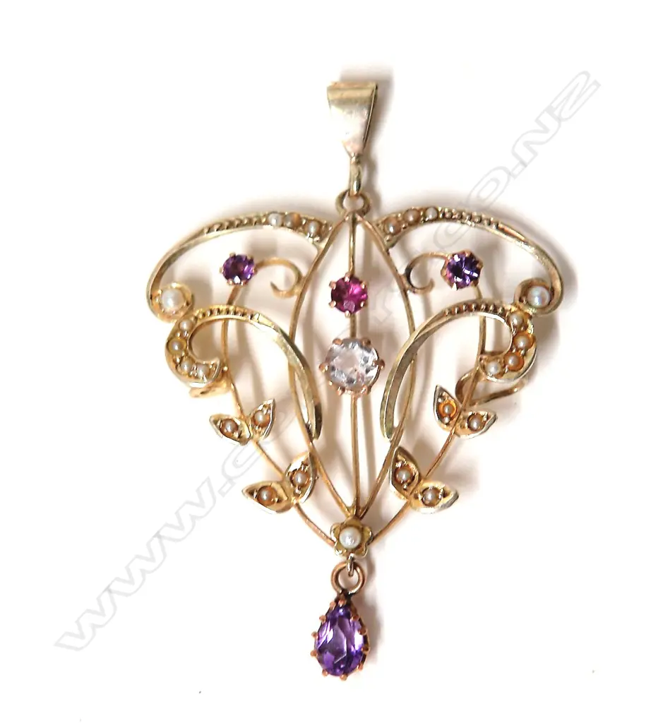 An Edwardian large 9ct. yellow gold coloured stone and seed pearl pendant Image 1++