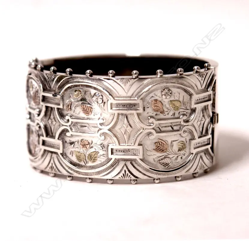 A Victorian silver fancy wide hinged bangle Image 1++