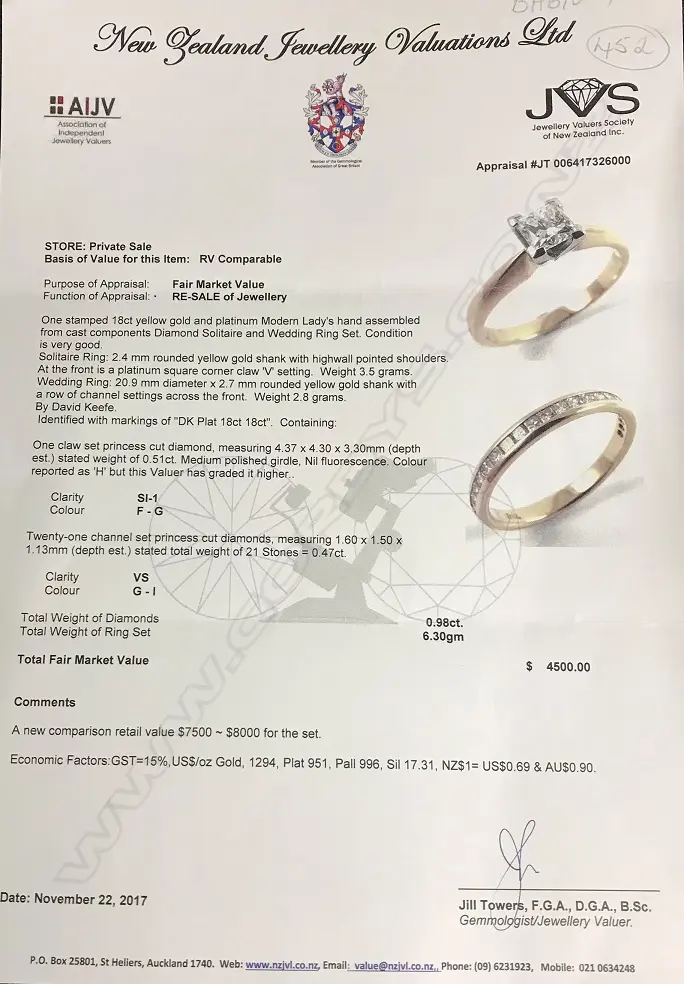 An 18ct. gold and diamond ring set Image 1++