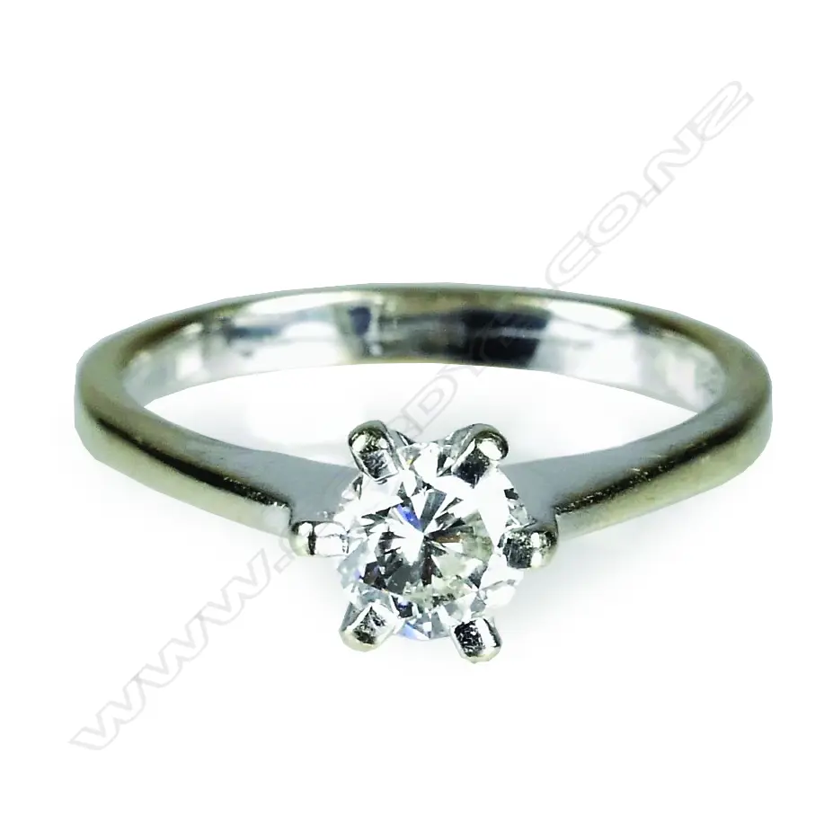 A 14ct. white gold and diamond solitaire ring Image 1++