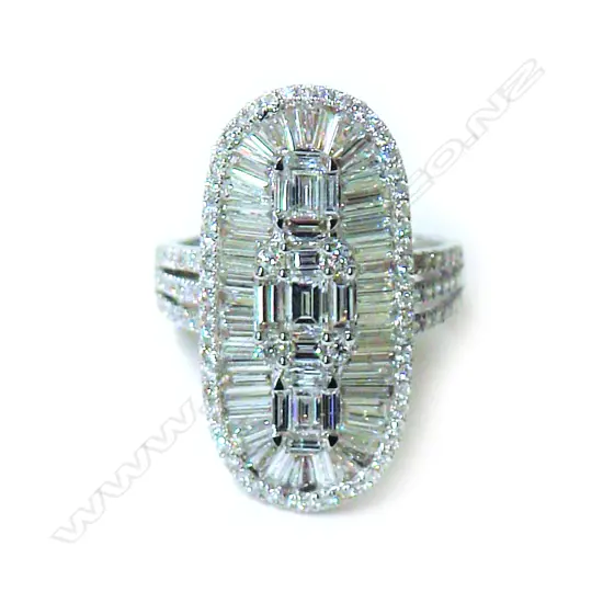 A lady's modern 18ct. white gold and multi-diamond cluster ring