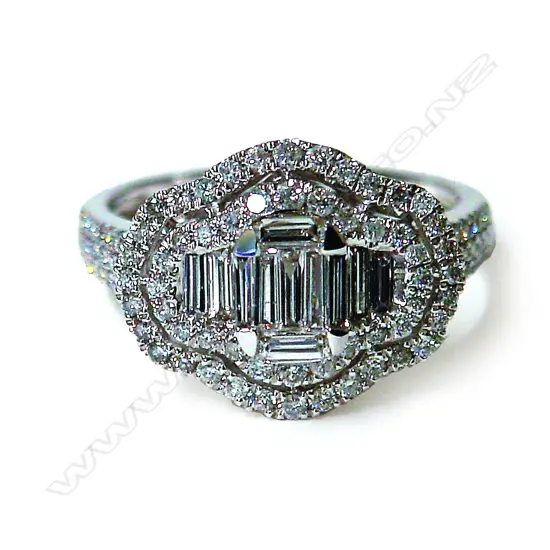 A lady's modern 18ct. white gold and diamond set cluster ring