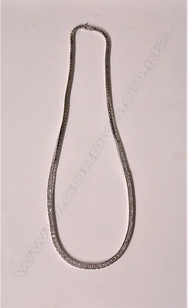 A lady's modern 18ct. white gold and fully diamond set necklace Image 1++