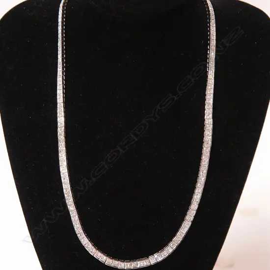 A lady's modern 18ct. white gold and fully diamond set necklace
