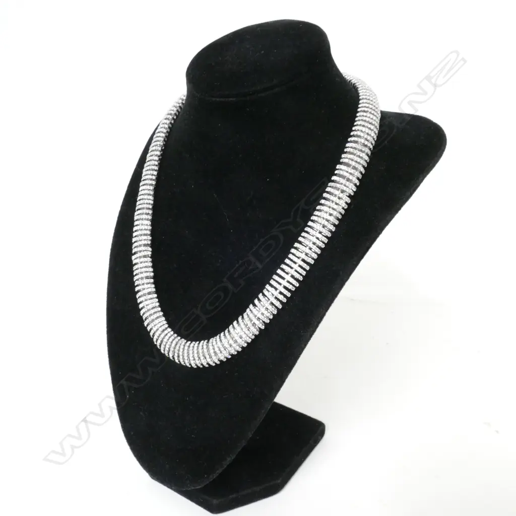 An impressive lady's modern 18ct. white gold and diamond set necklace Image 1++