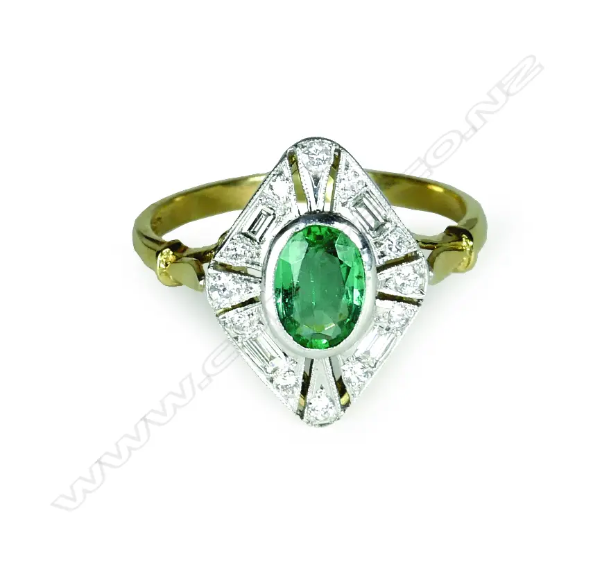 An 18ct. gold diamond and emerald Art Deco style ring Image 1++