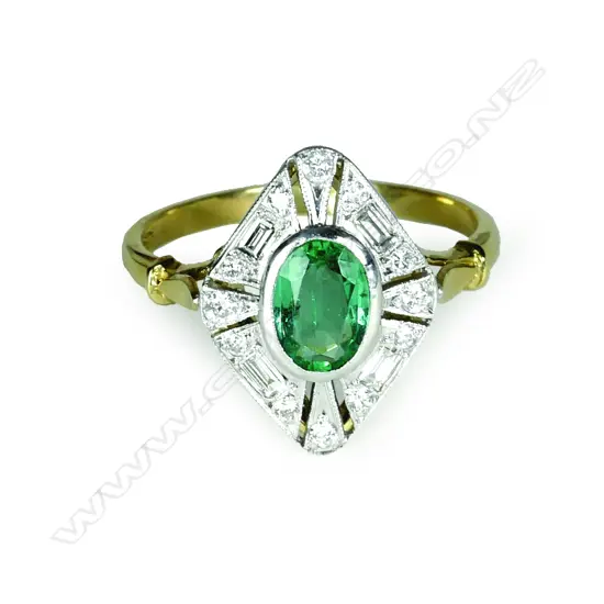 An 18ct. gold diamond and emerald Art Deco style ring