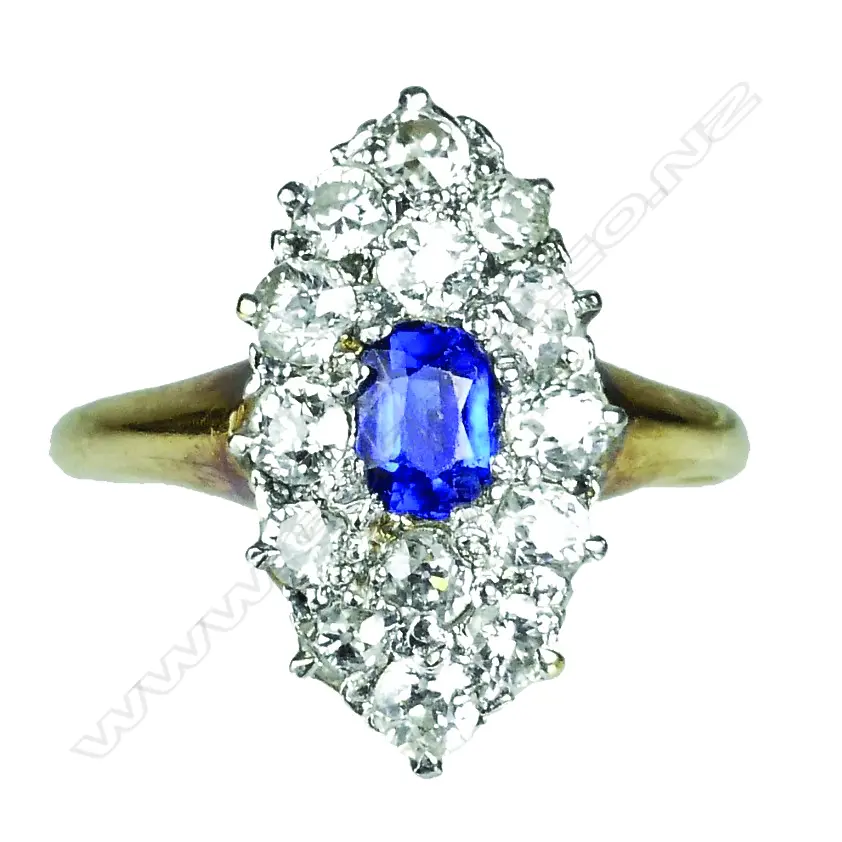 An estate 18ct. gold diamond and sapphire ring Image 1++