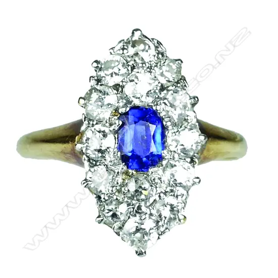 An estate 18ct. gold diamond and sapphire ring