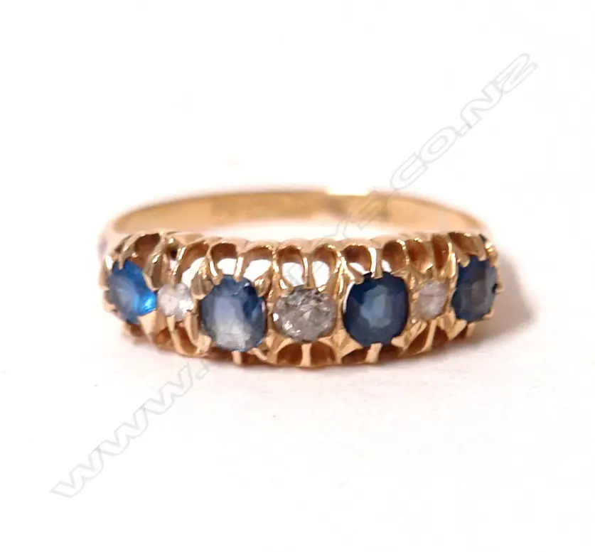 A late Victorian 18ct. yellow gold sapphire and diamond bridge ring Image 1++