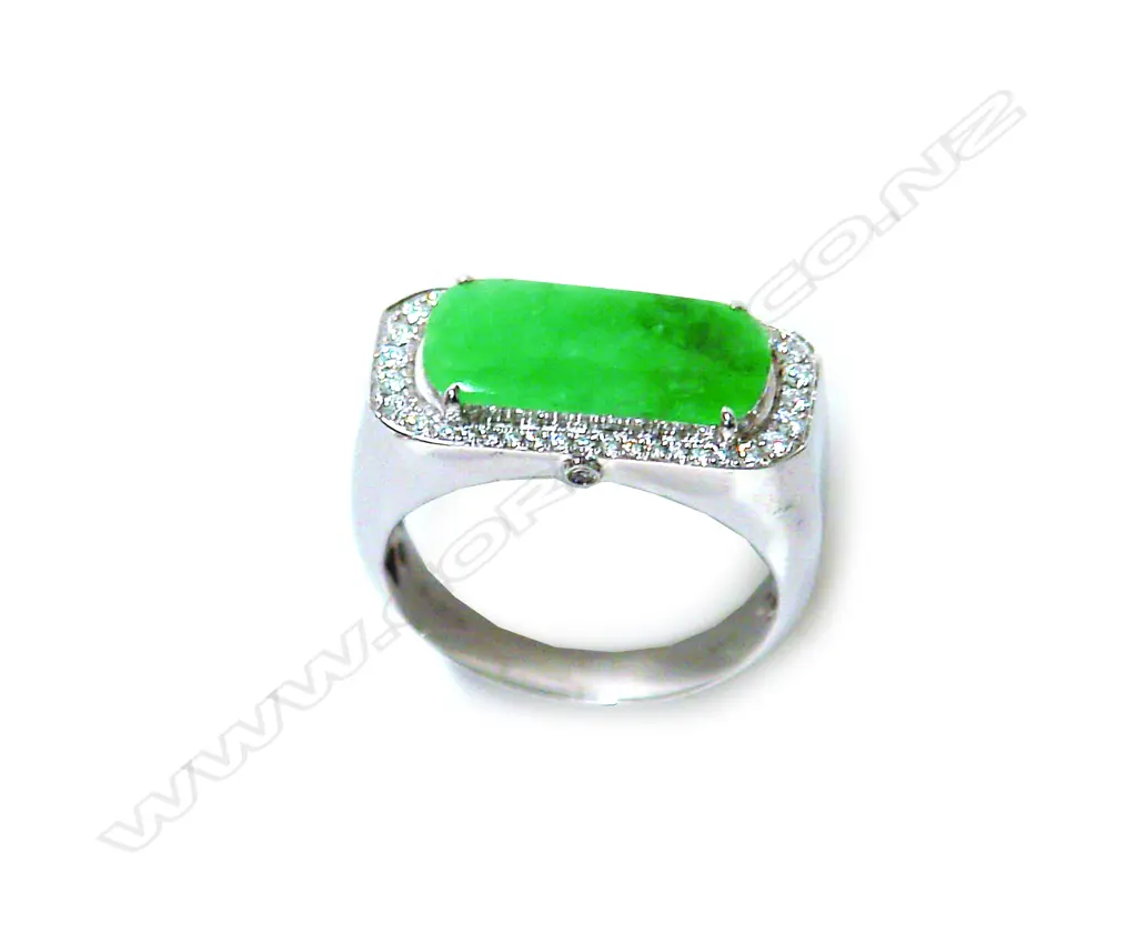 A modern 18ct. white gold jade and diamond dress ring Image 1++