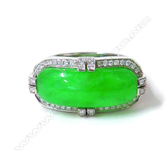 A modern substantial 18ct. white gold jade and diamond dress ring