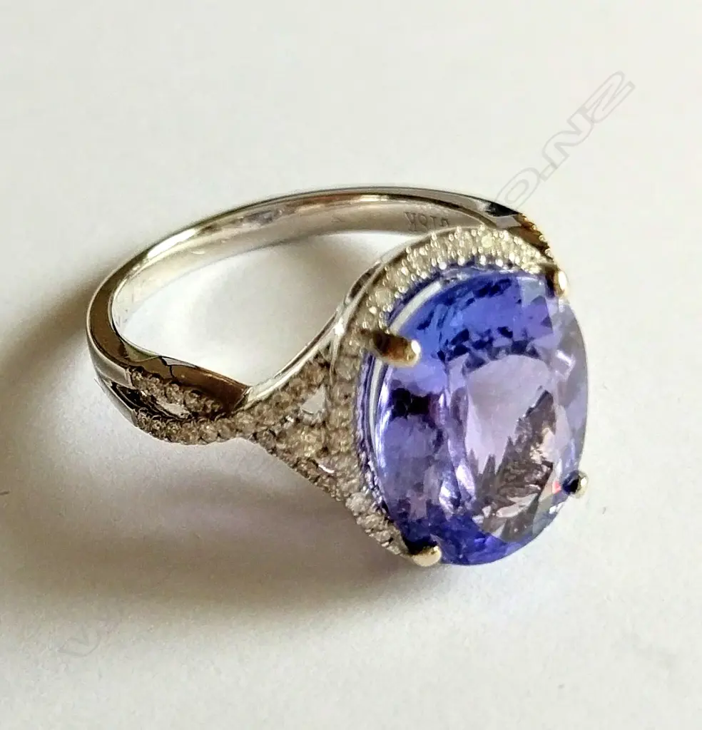 An 18ct white gold 5 carat tanzanite and diamond dress ring Image 1++