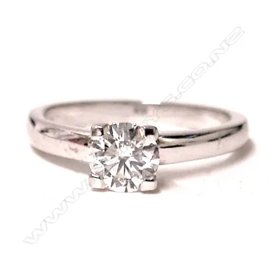 A lady's 18ct. white gold and diamond solitaire ring