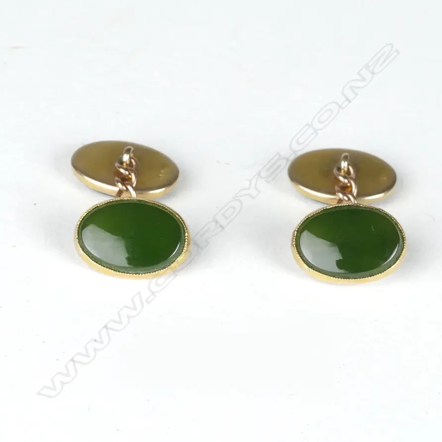 A pair of 9ct. gold and greenstone cufflinks Image 1++