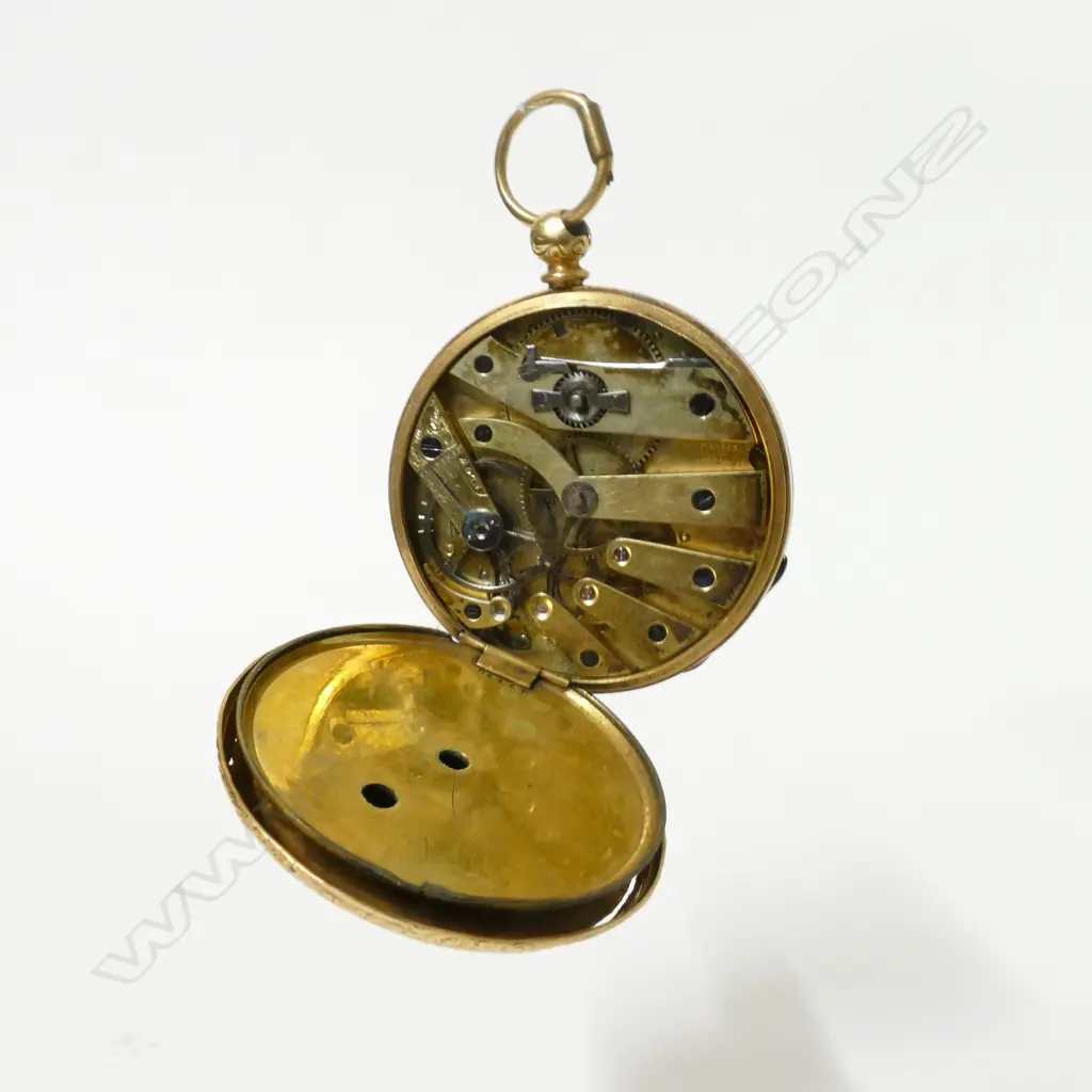 An 18ct. gold open face pocket watch Image 1++