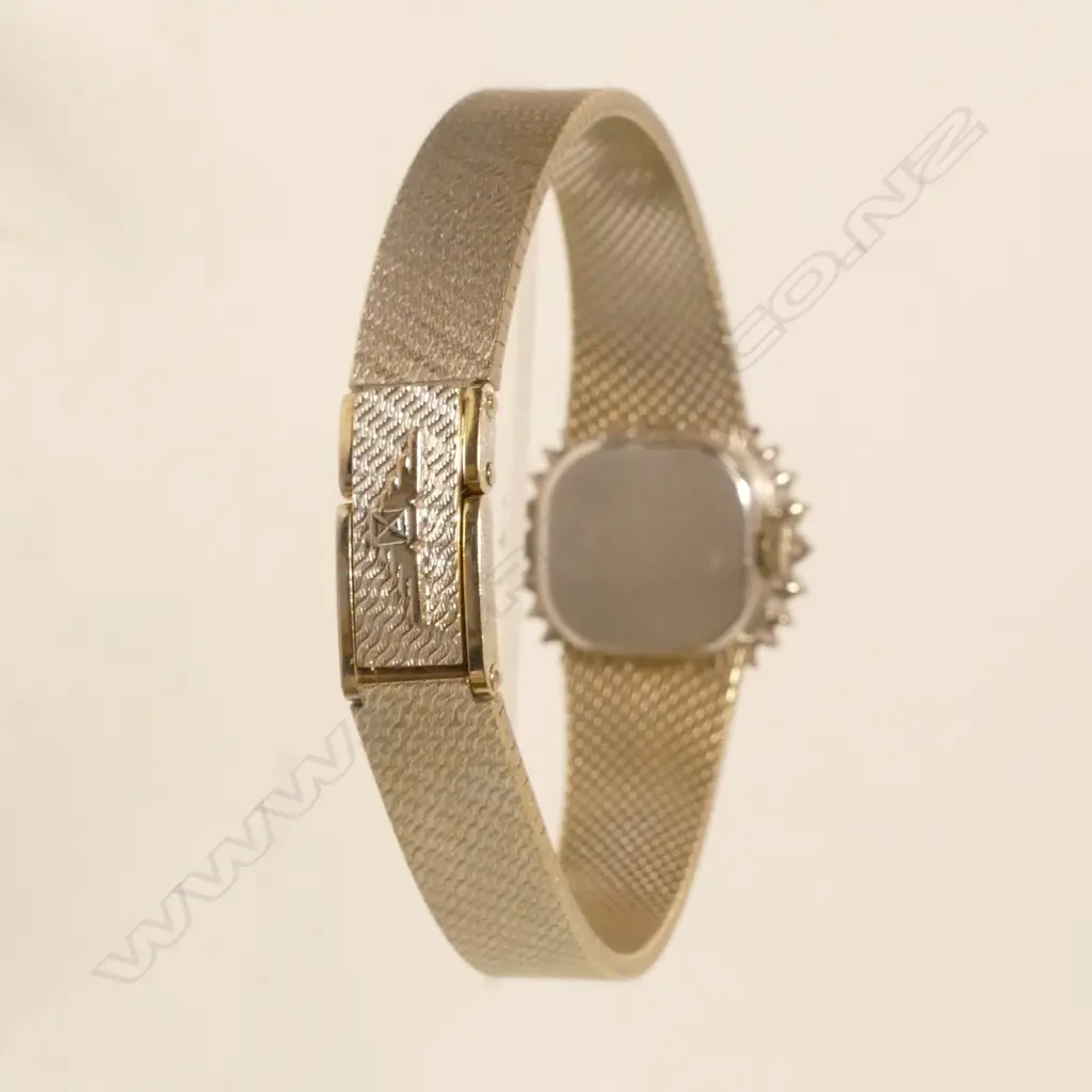 A lady's 18ct. white gold and diamond Longines wristwatch Image 1++
