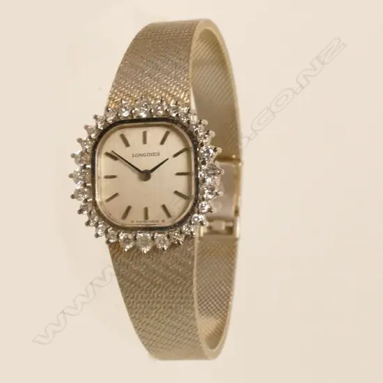 A lady's 18ct. white gold and diamond Longines wristwatch