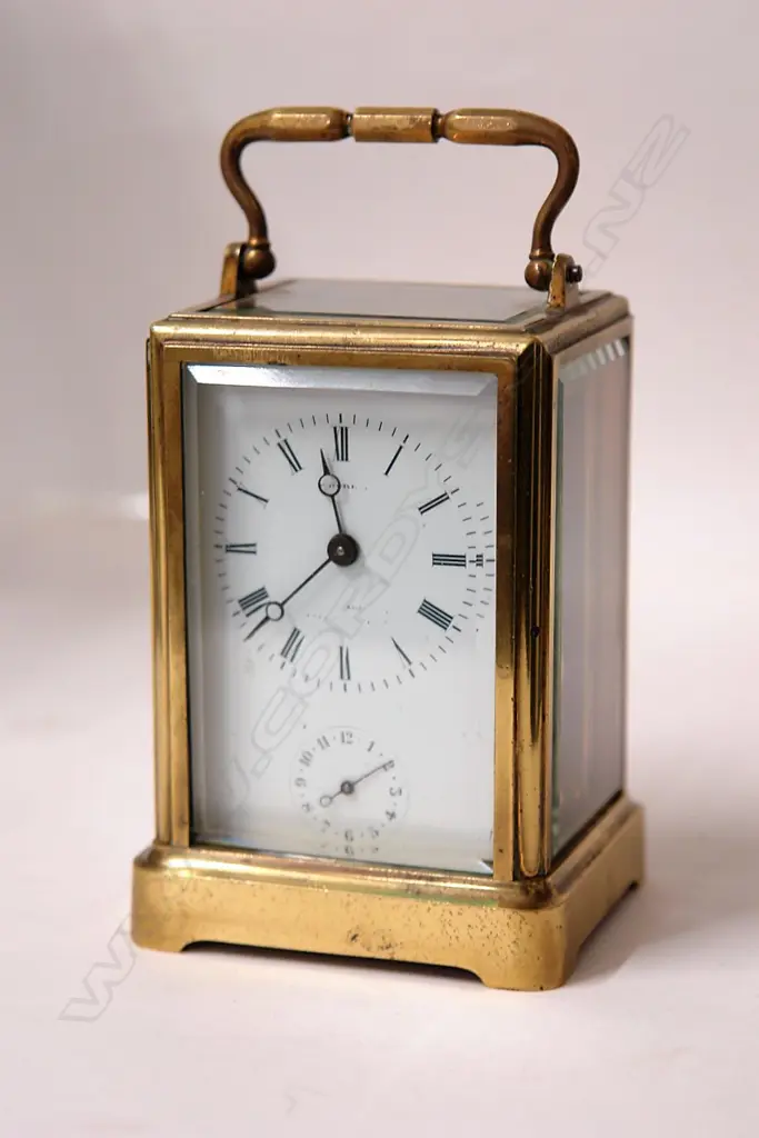 A 19thC French brass striking carriage clock Image 1++