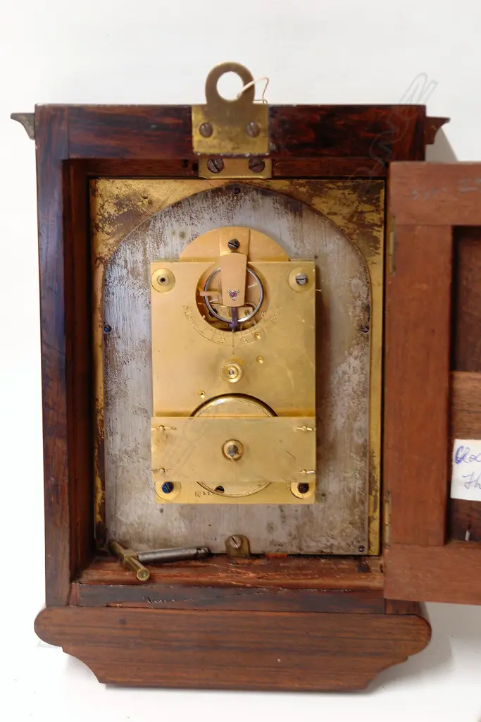 A 19thC mahogany small cased wall timepiece Image 1++
