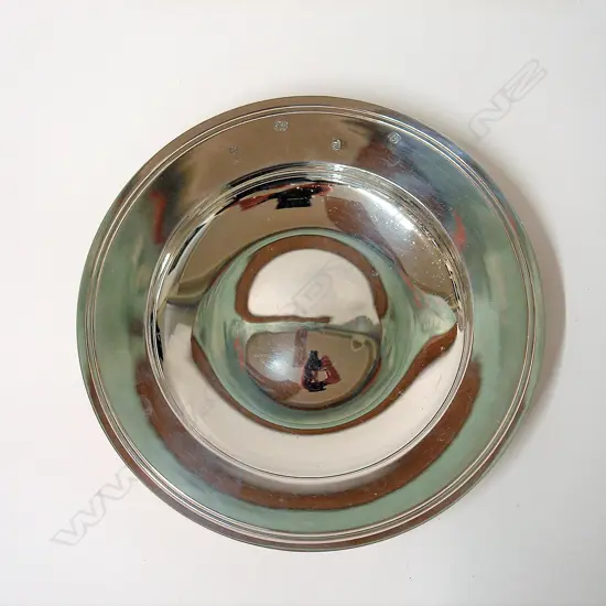 A large silver Armada dish
