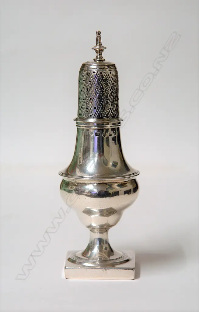 A George III silver caster Image 1++