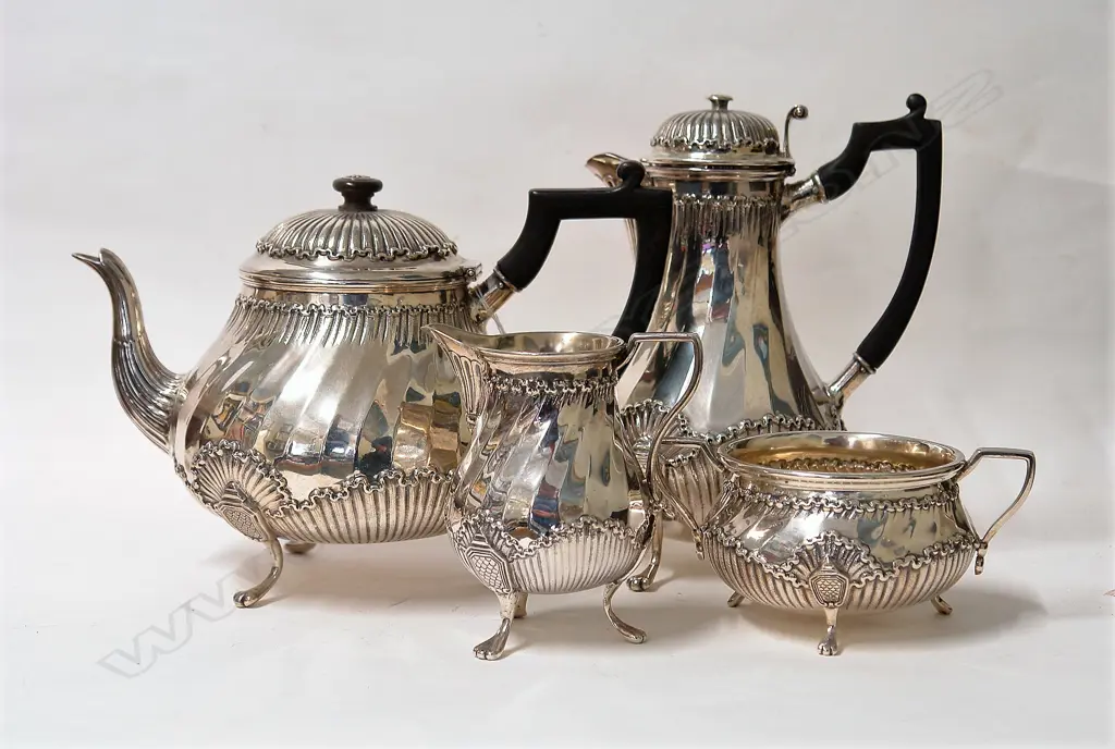 A late Victorian silver four-piece tea service Image 1++