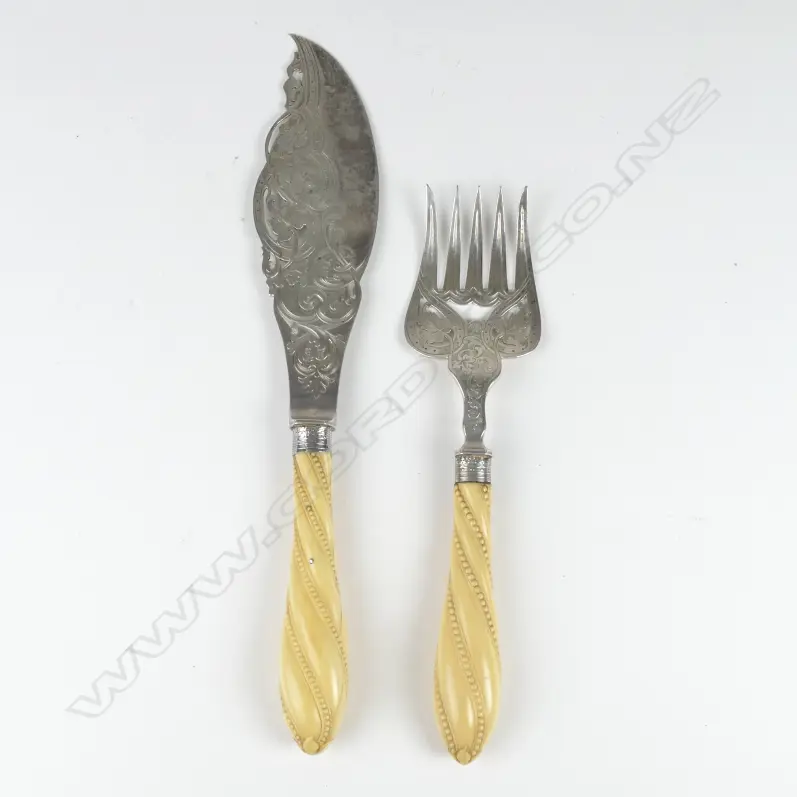 A pair of mid-Victorian silver and ivory fish servers Image 1++
