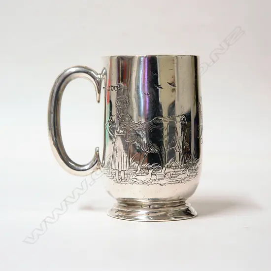 A Victorian silver picture engraved christening mug