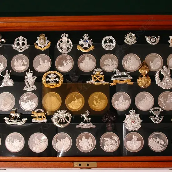 A modern limited edition silver medallion and military badge set 'Great British Regiments'