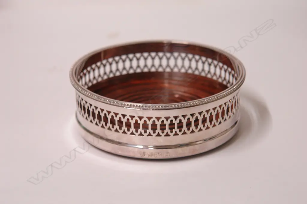 A modern silver galleried wine coaster Image 1++