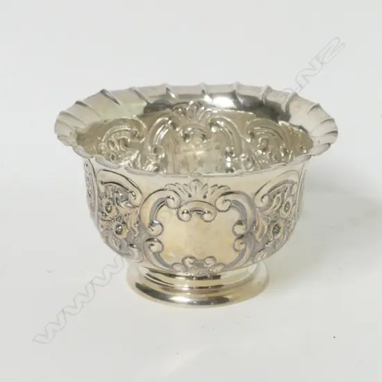 A silver sugar bowl