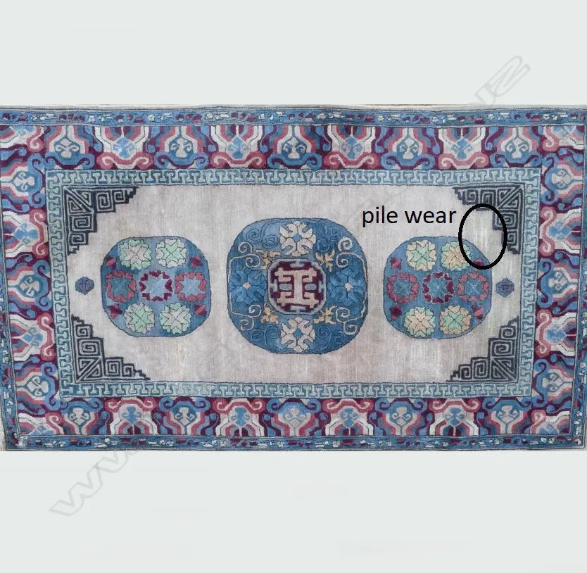 An old handmade Chinese wool rug Image 1++