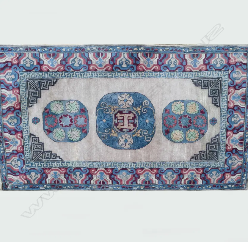 An old handmade Chinese wool rug Image 1++